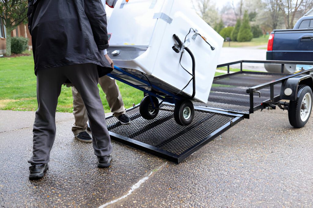 A black African-American man delivering a washing machine